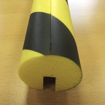 black and yellow round slotted foam edge