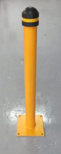 capped yellow bollard
