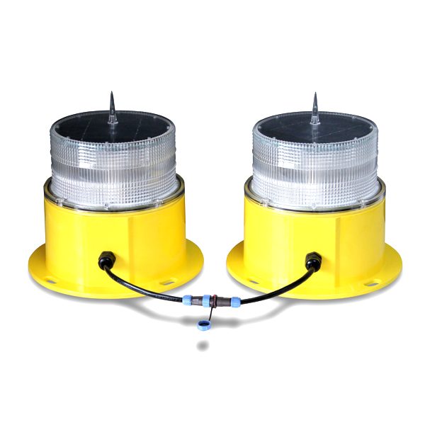 pair of yellow solar powered obstruction light